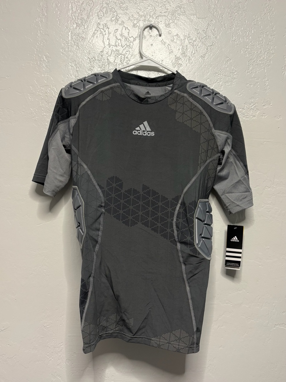 New kids size large adidas tech fit iron skin football compression shirt, #I1156